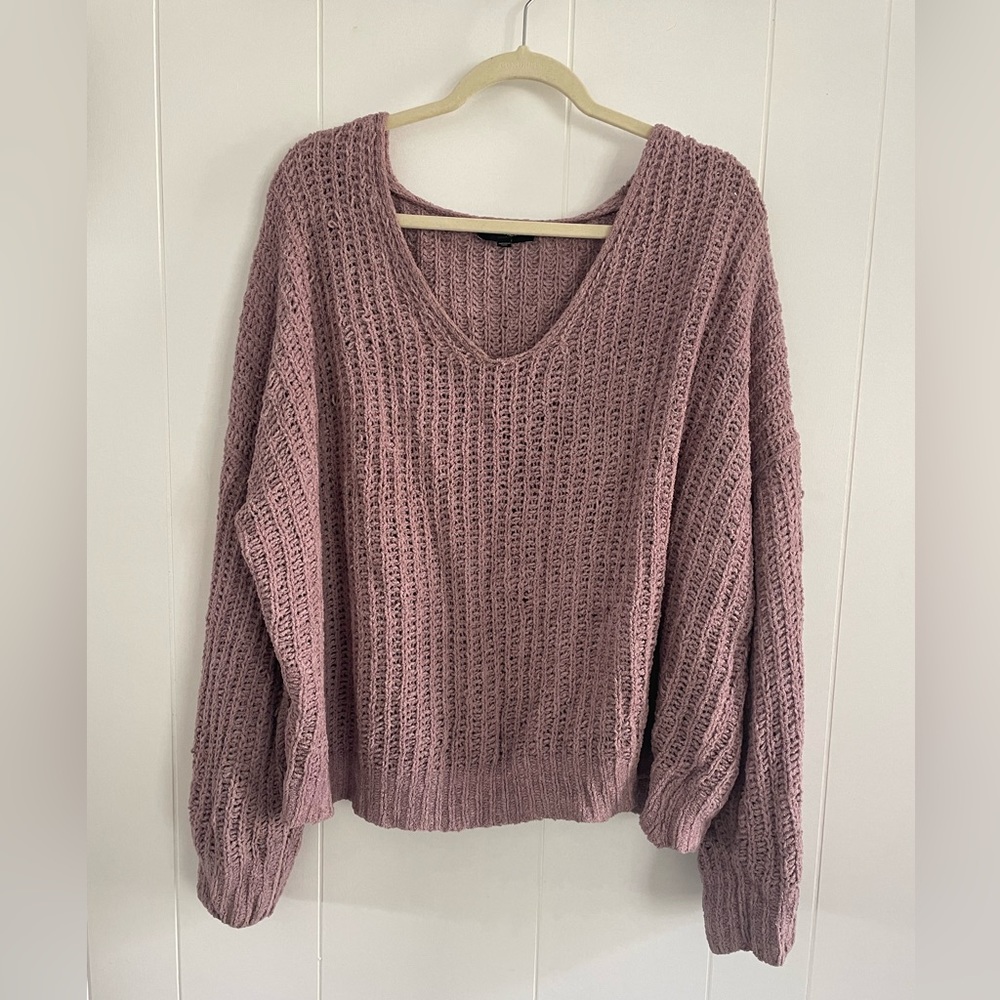 Long purple knitted sweater